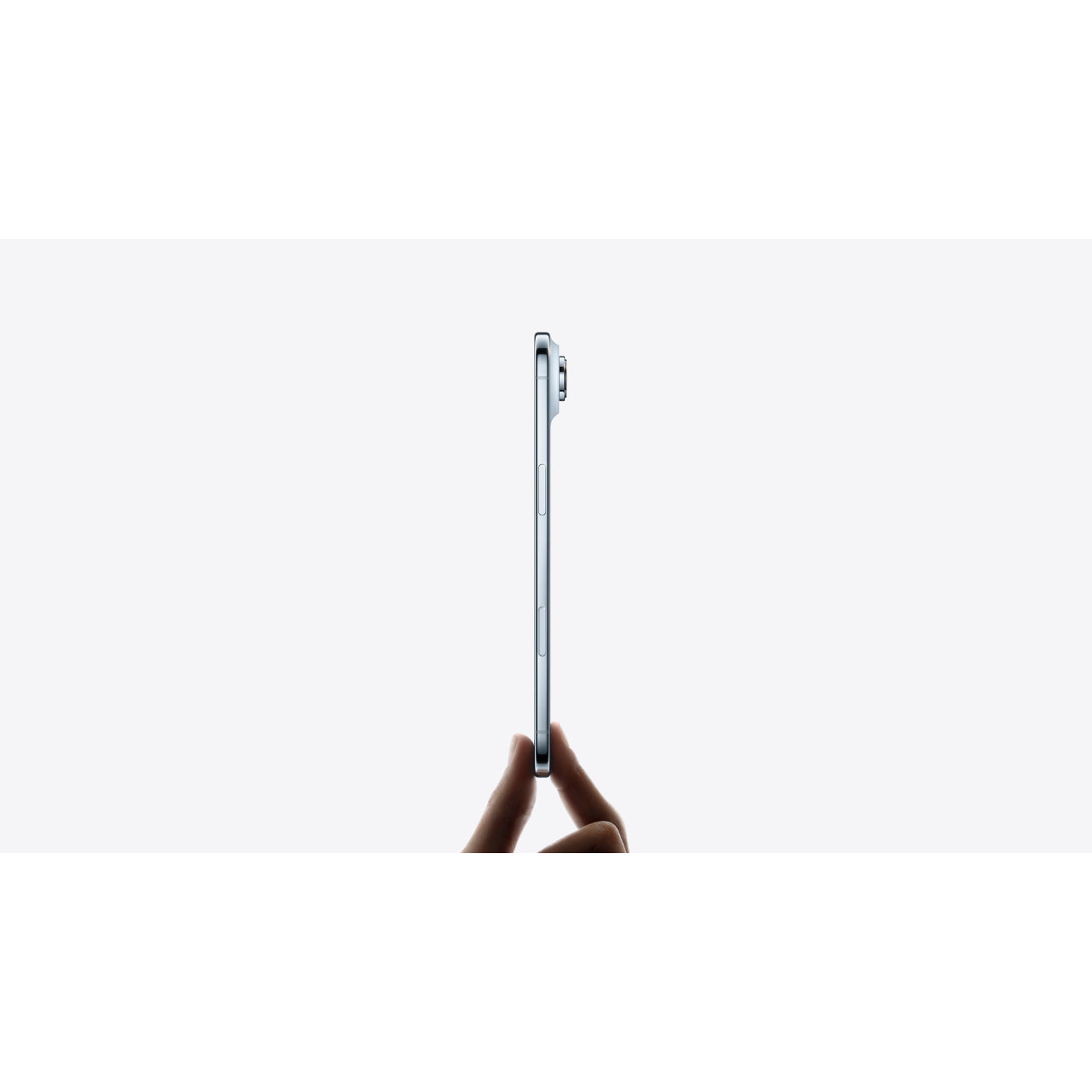 Lifestyle: holding the 5.64 mm iPhone Air edge-on