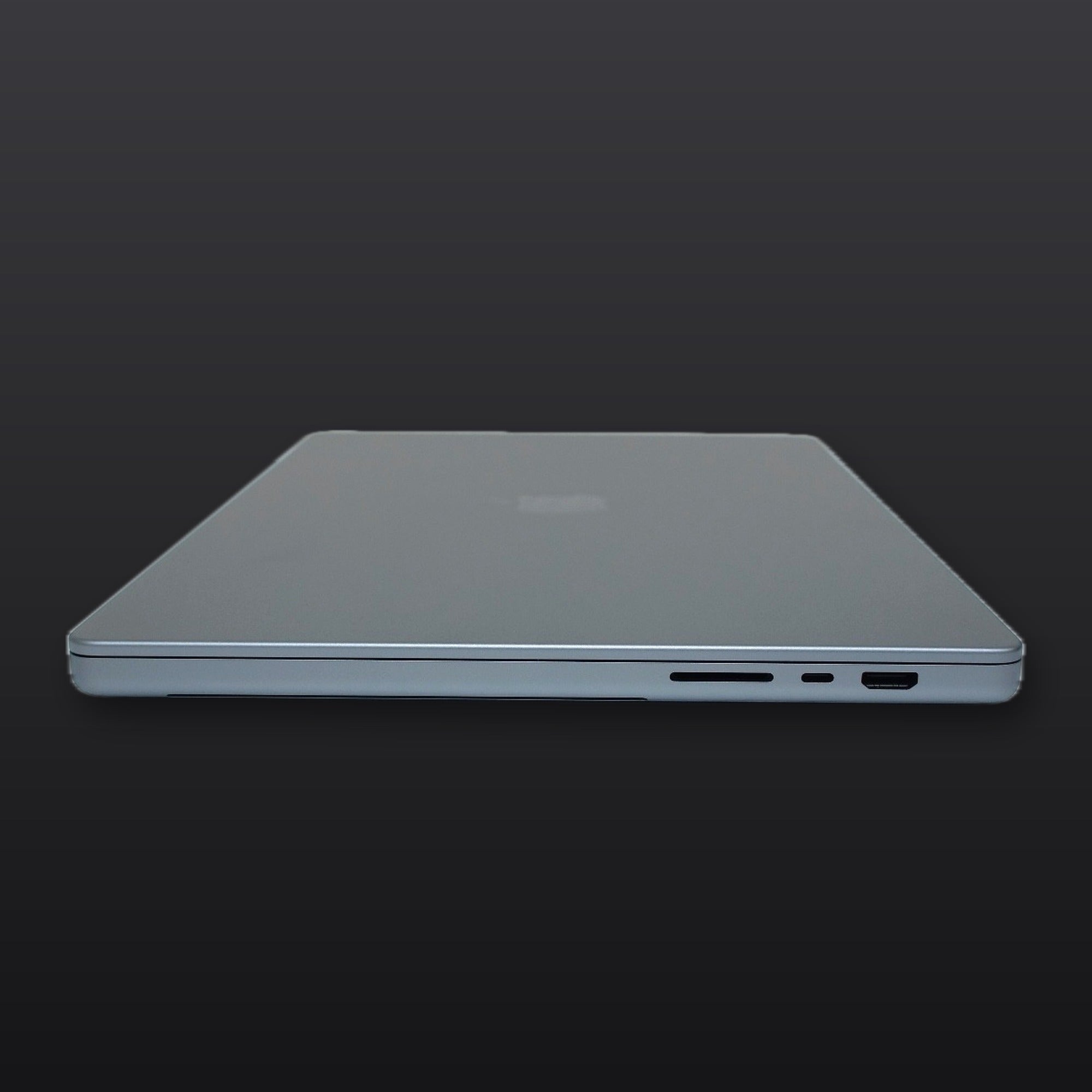Actual MacPro-LA unit — Apple MacBook Pro 16-inch M1 Max, 64GB RAM, 4TB SSD, Space Gray — right side ports: SDXC, Thunderbolt 4, HDMI